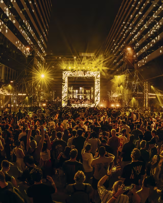 Stage lights down the park at night