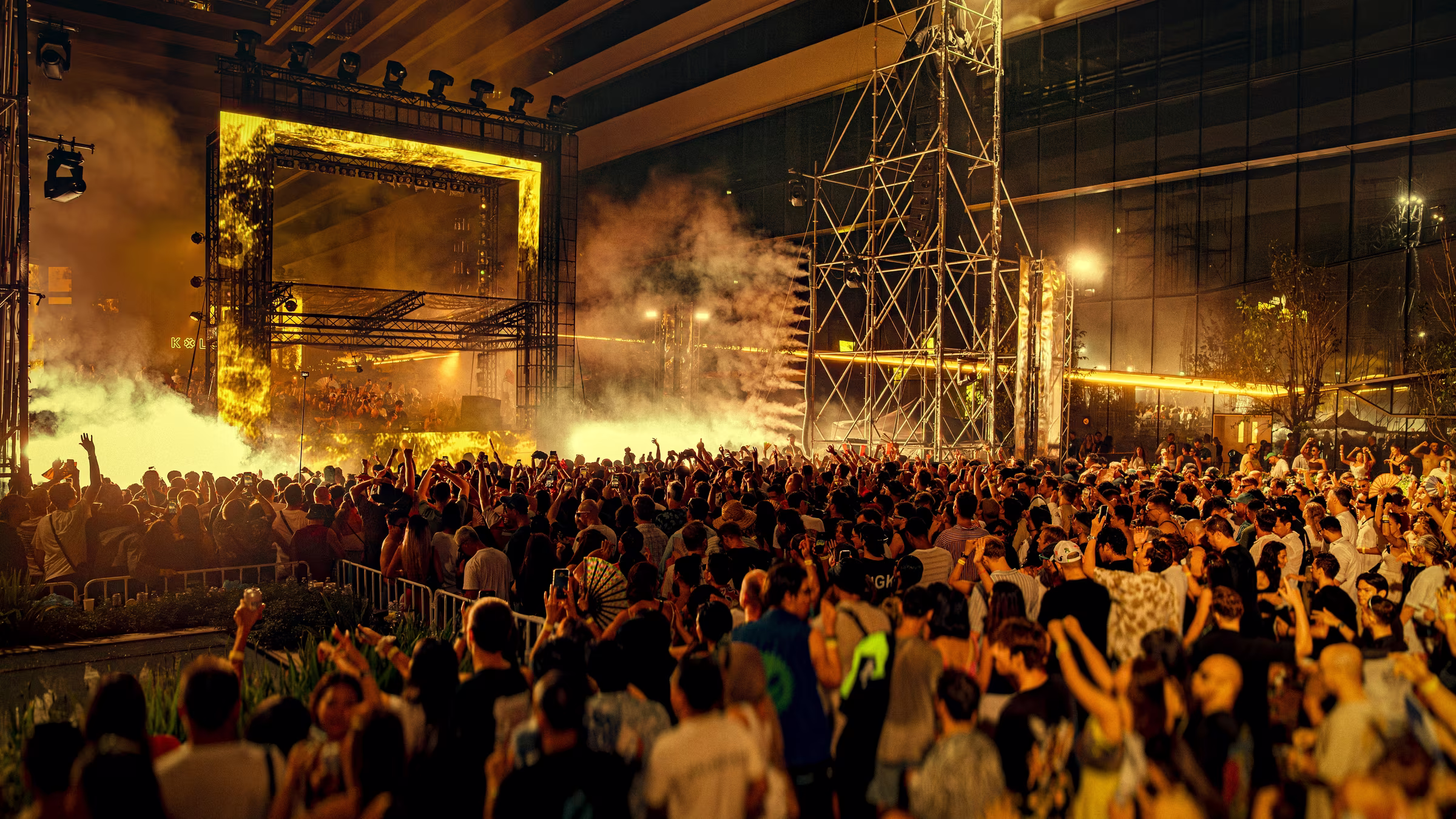 The crowd at the Kolour park stage at Cloud 11, Bangkok, lights and smoke over the dance floor