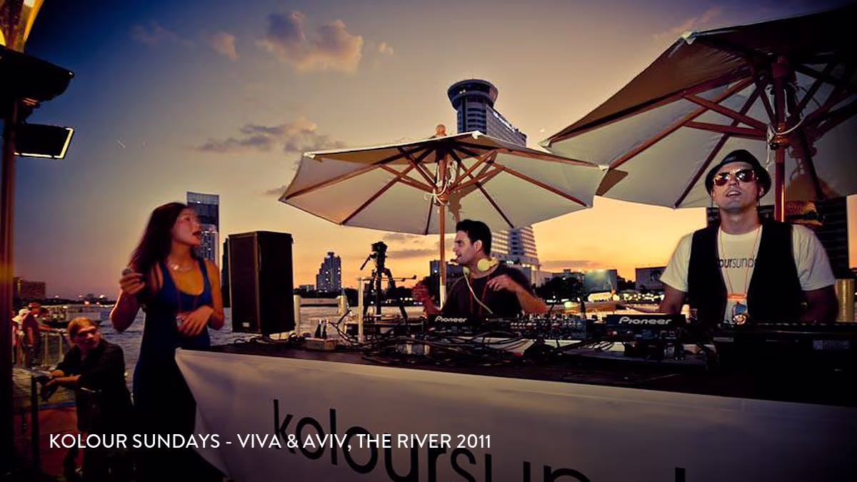 Kolour Sundays DJ booth on the river at sunset, 2011